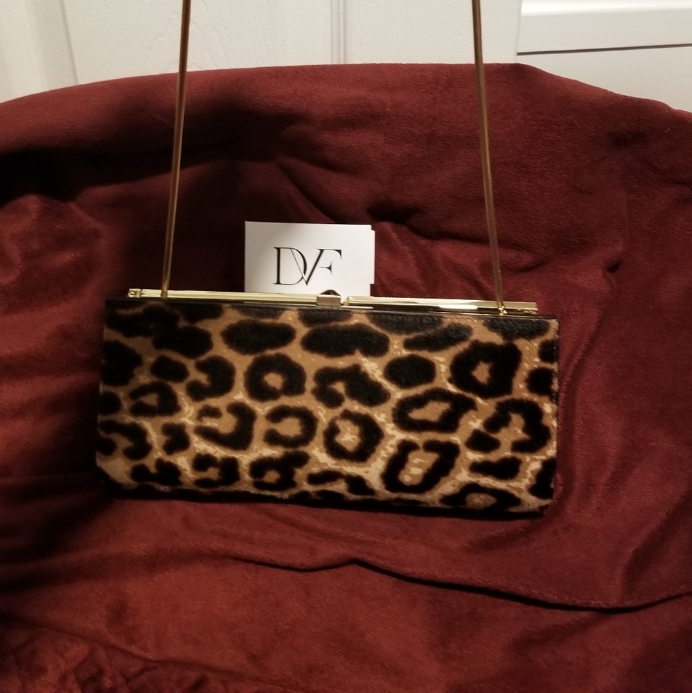 A brand new DVF clutch